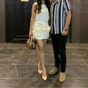 White Sleeveless Top and Skirt Set with Floral Accents